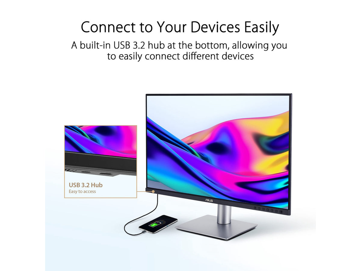 ASUS PA329CRV-P 32-inch monitor on desk in a modern professional studio setting
