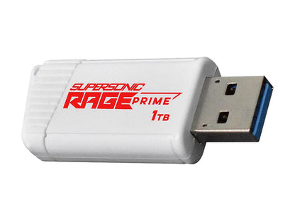 Supersonic Rage Prime 1TB USB 3.2 Gen 2 drive plugged into laptop USB port demonstrating compact portable size