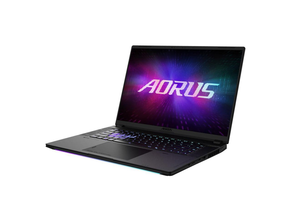 GIGABYTE AORUS Master 16 keyboard and trackpad close-up, per-key RGB lighting and tactile keys